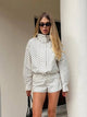 Women's polka dot jacket with high collar, long sleeves and cropped elasticated hem