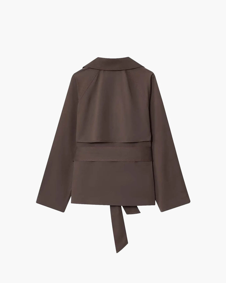 Women's short belted trench coat with notched lapels and long sleeves