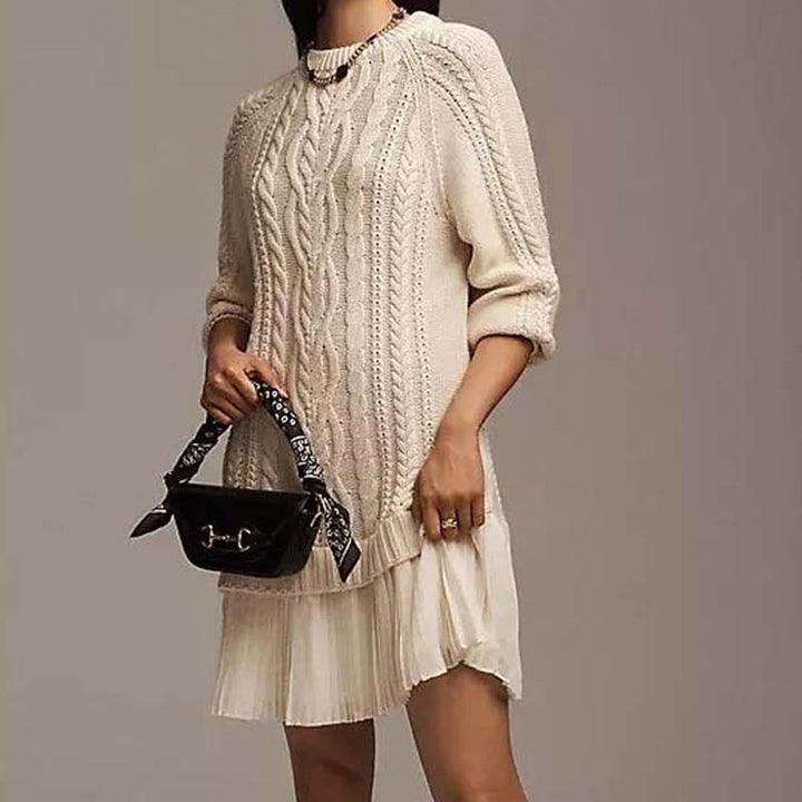 Women's cable knit mini dress with long sleeves and pleated hem