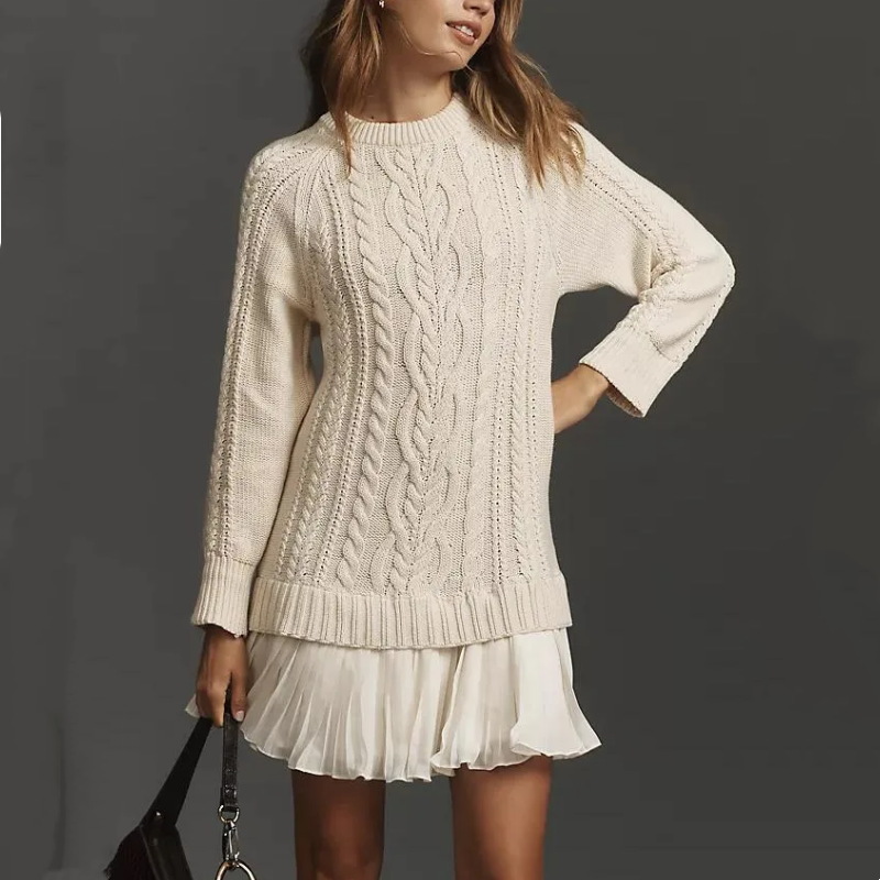 Women's cable knit mini dress with long sleeves and pleated hem