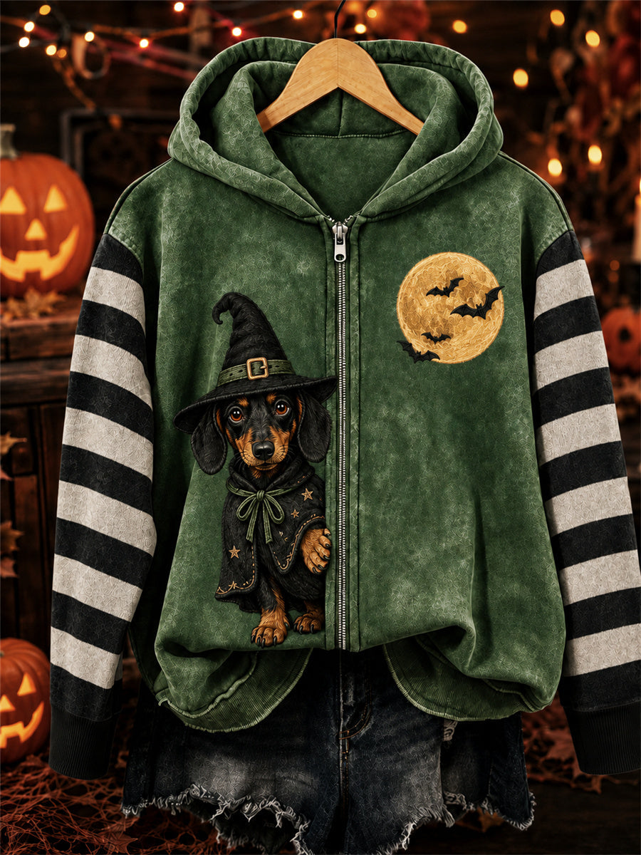 Women's green hoodie with a dachshund witch graphic, striped sleeves and front zip