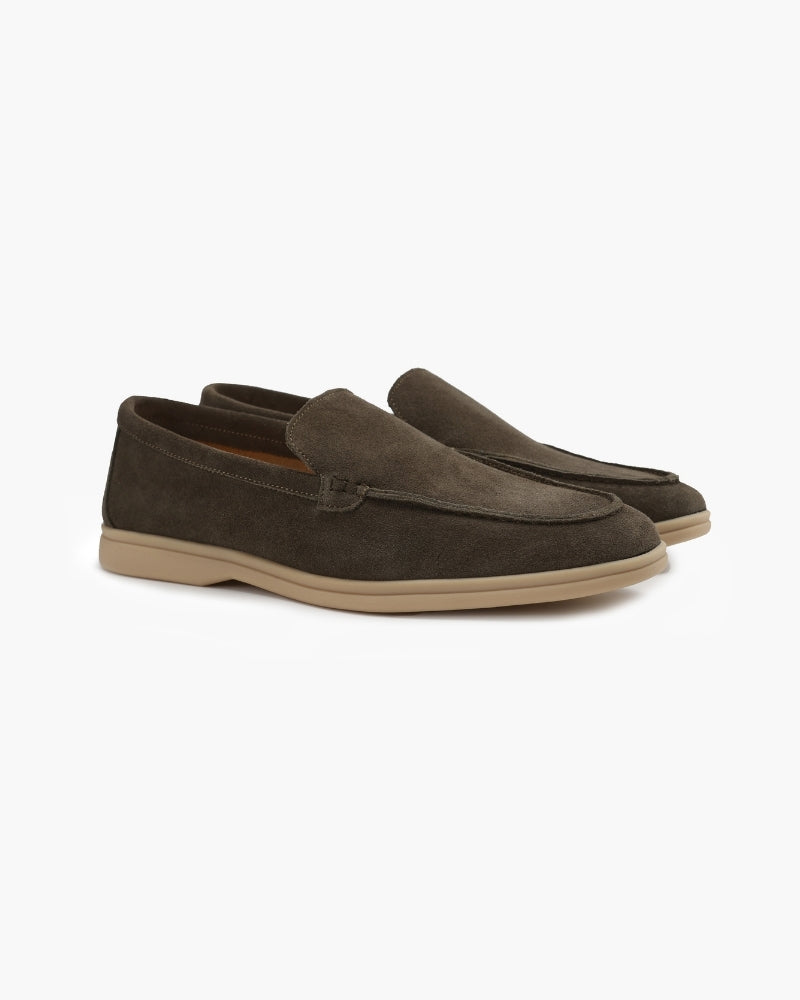 Unisex slip-on loafers with penny strap detail and flat soles