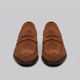 Men's suede penny loafers with round toes and low heels