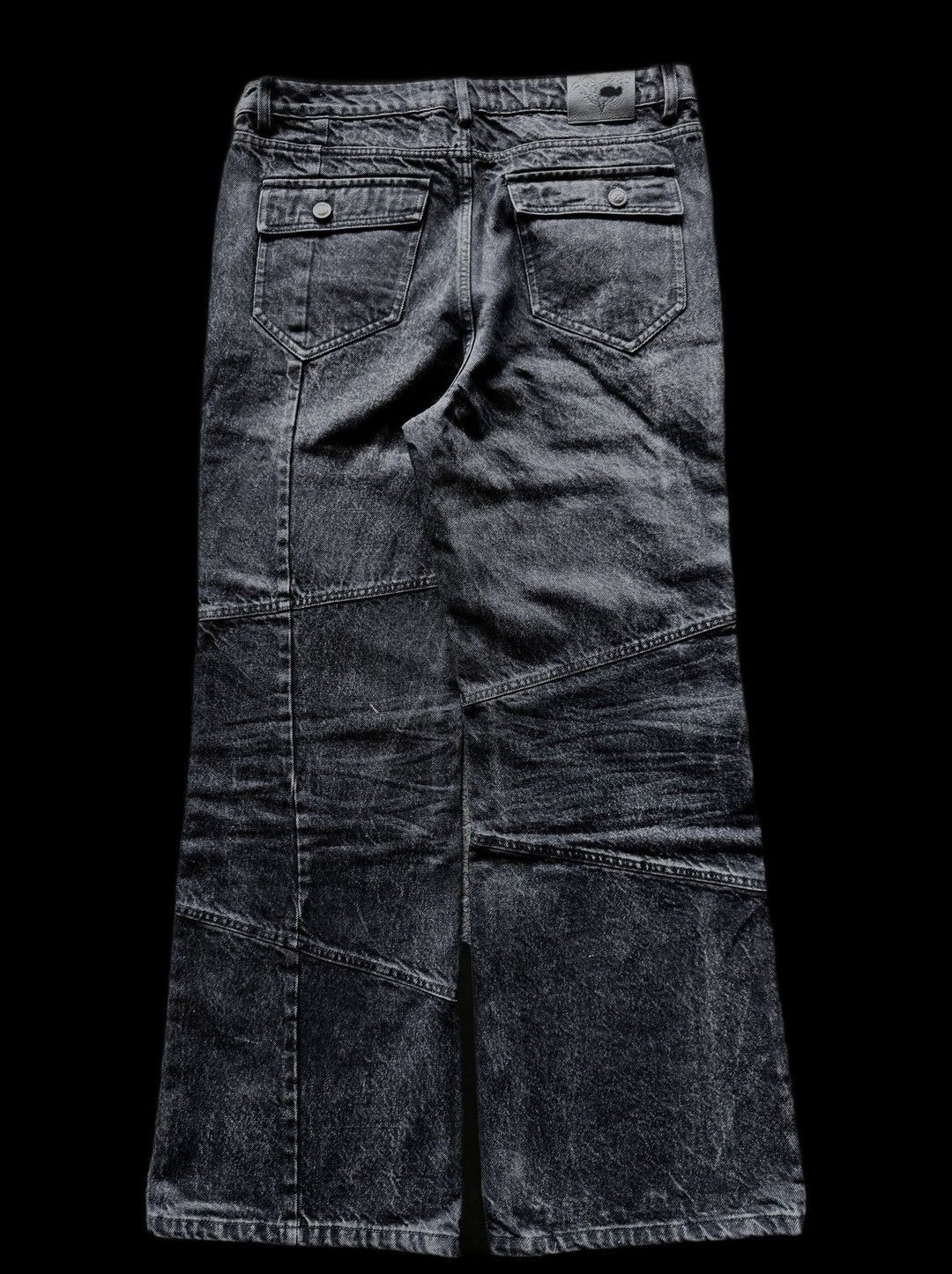 Women's dark black flared jeans with panel seams and patch pockets