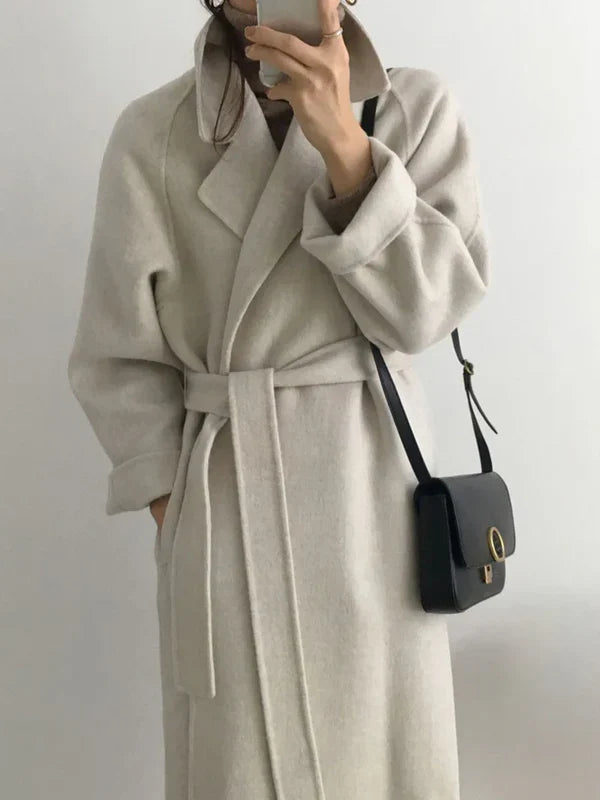 Women's long wrap coat with lapels and waist tie