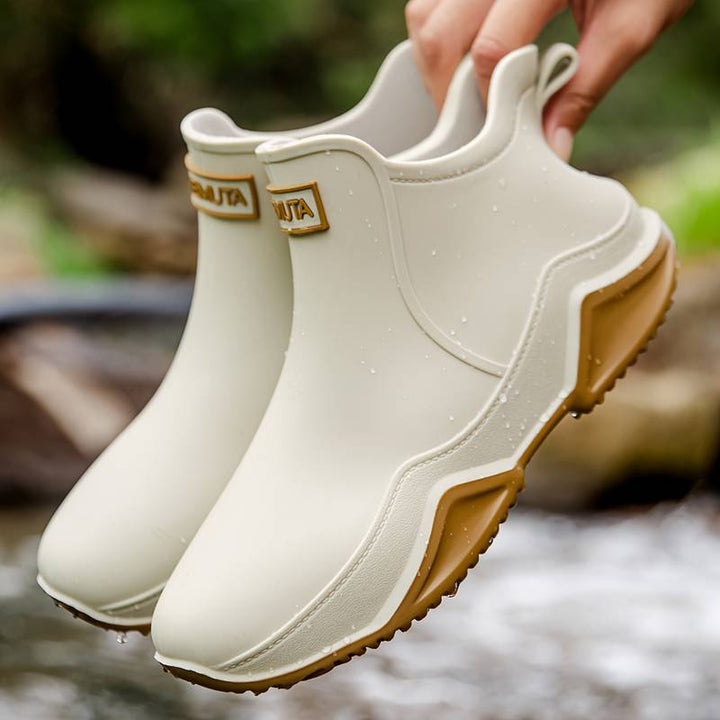 Women's slip-on round toe ankle boots with lug soles