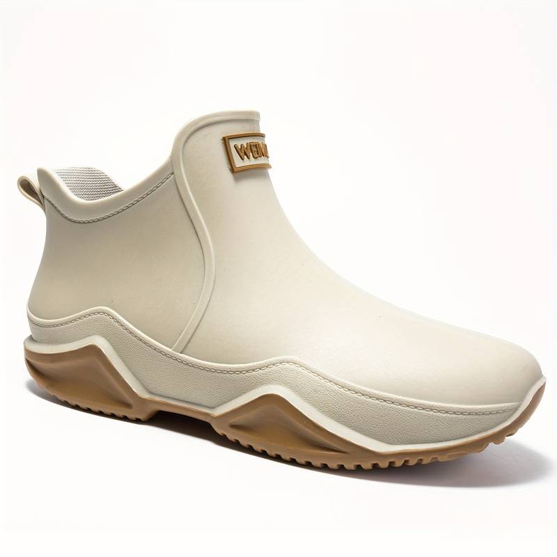 Women's slip-on round toe ankle boots with lug soles