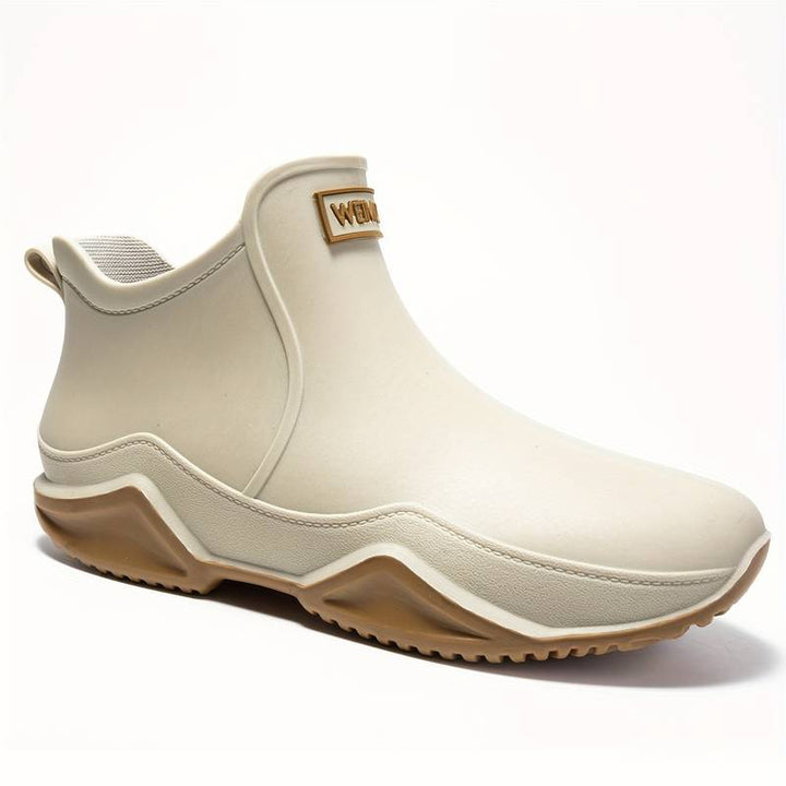 Women's slip-on round toe ankle boots with lug soles