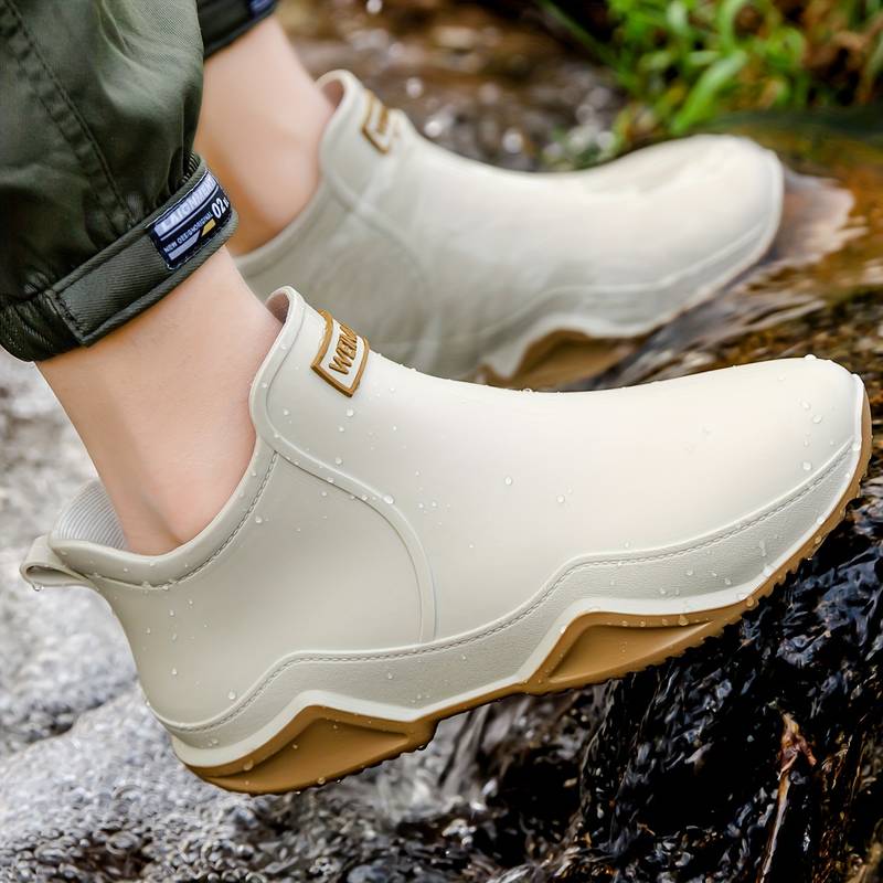 Women's slip-on round toe ankle boots with lug soles