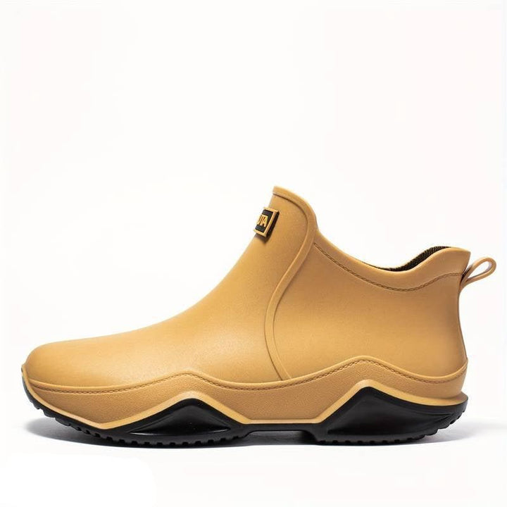 Women's slip-on round toe ankle boots with lug soles