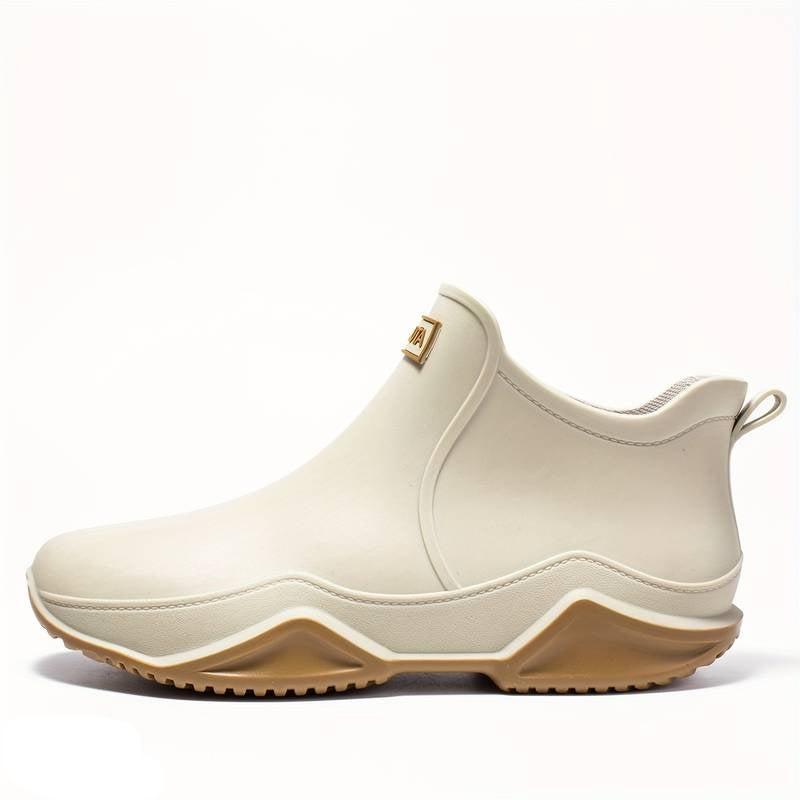 Women's slip-on round toe ankle boots with lug soles