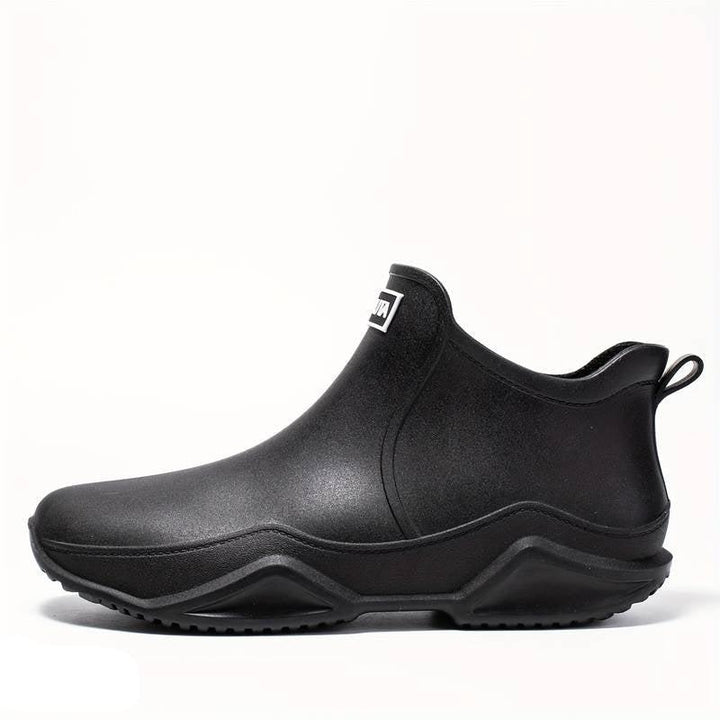 Women's slip-on round toe ankle boots with lug soles