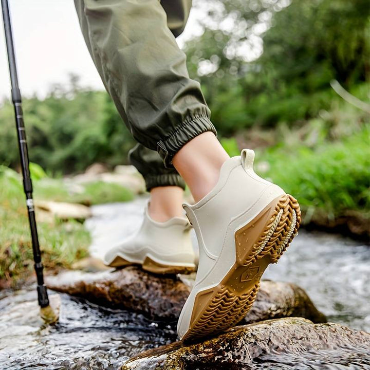 Women's slip-on round toe ankle boots with lug soles