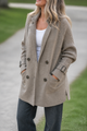 Women's longline coat with double-breasted buttons and cable-knit sleeves