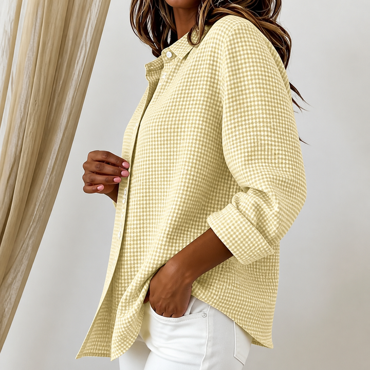 Women's checked long-sleeve button-down shirt with pointed collar and curved hem