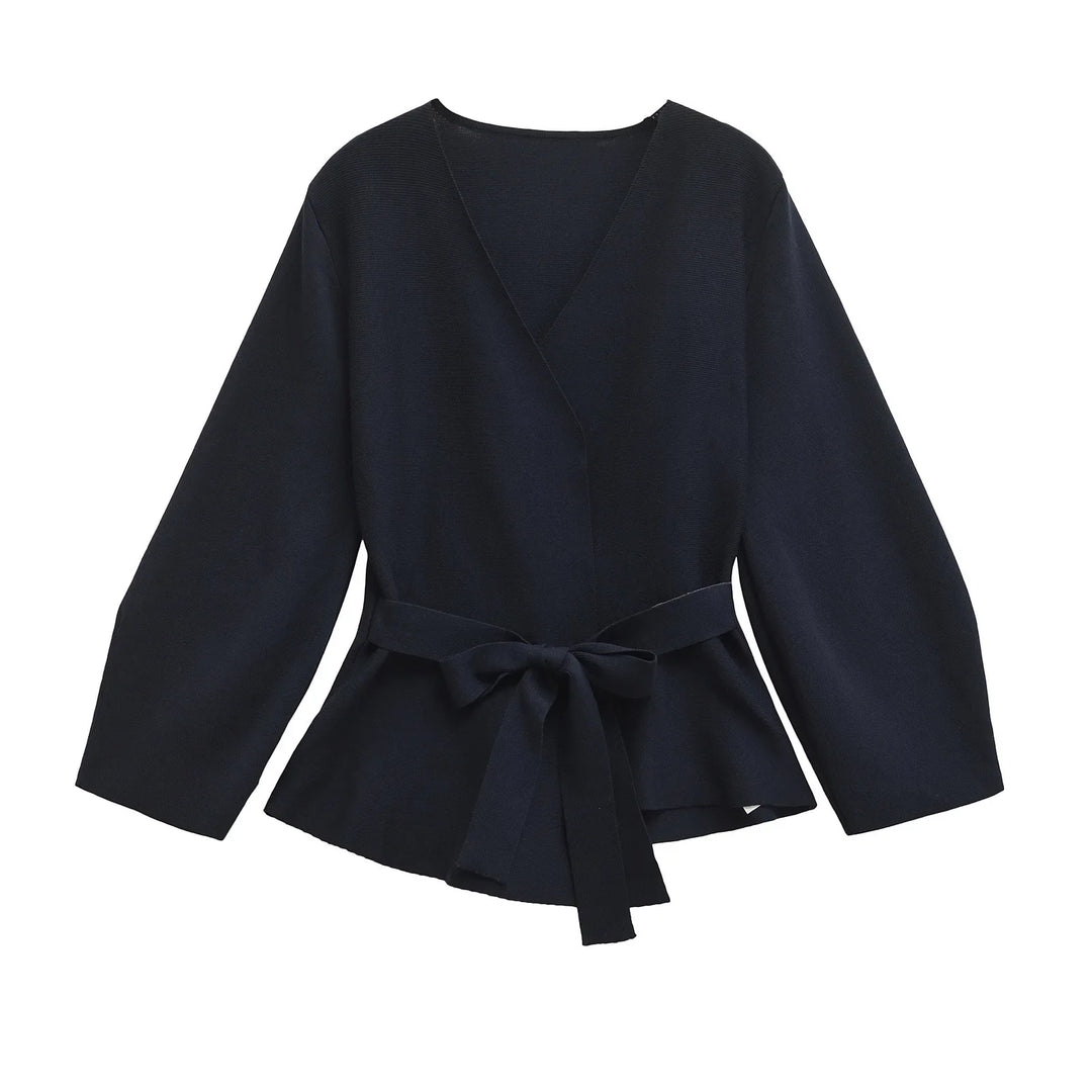 Women's wrap knit top with V-neckline, long sleeves and front tie waist