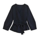 Women's wrap knit top with V-neckline, long sleeves and front tie waist