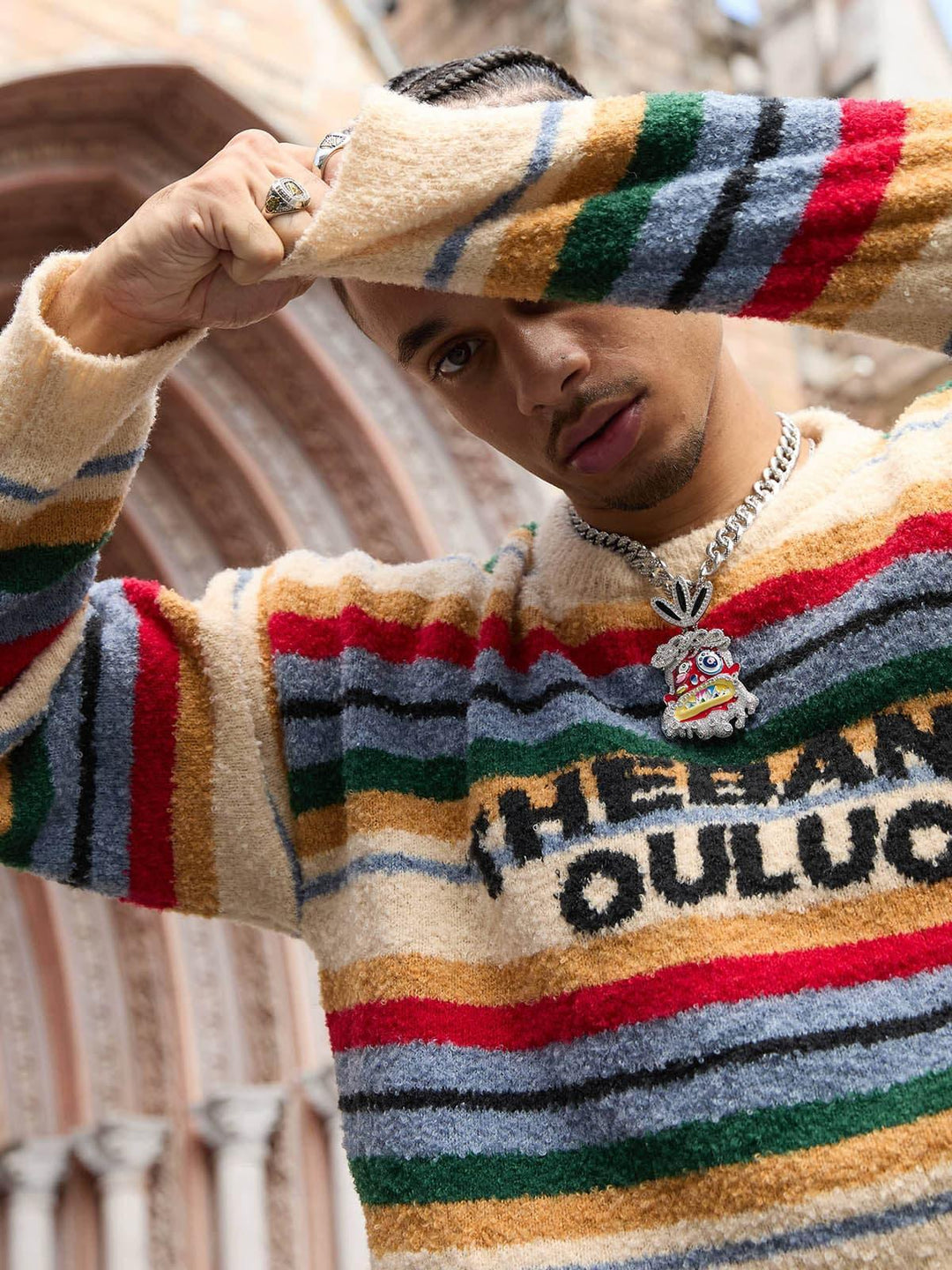 Striped crew neck jumper with long sleeves and chest text