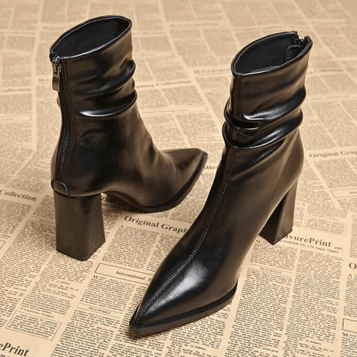 Pointed toe slouch ankle boots with high block heels and side zips