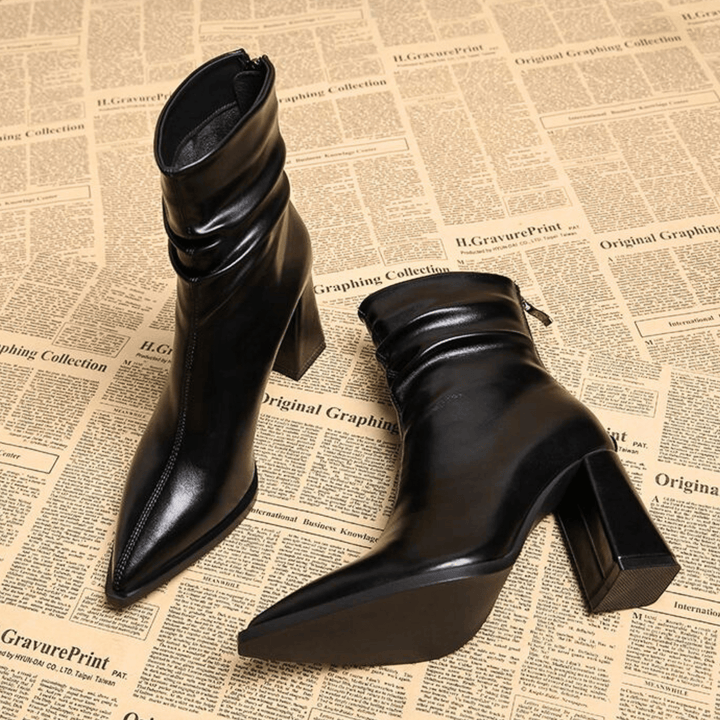 Pointed toe slouch ankle boots with high block heels and side zips