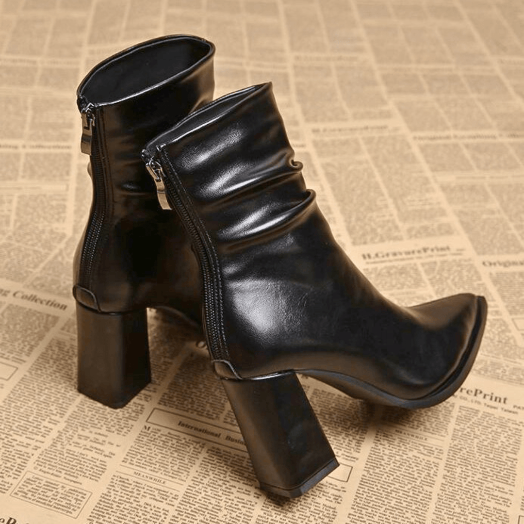 Pointed toe slouch ankle boots with high block heels and side zips