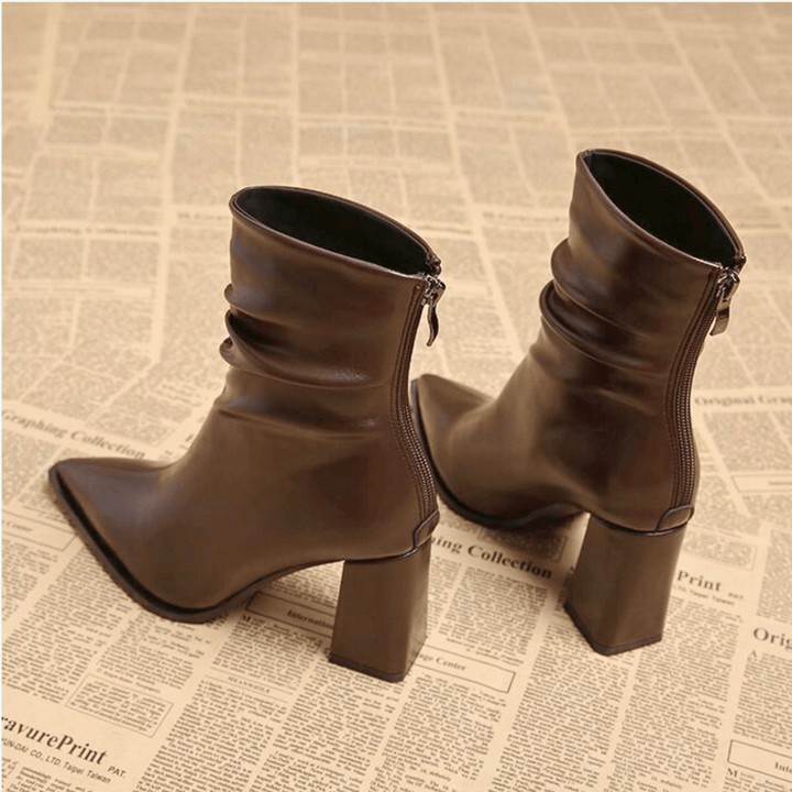 Pointed toe slouch ankle boots with high block heels and side zips