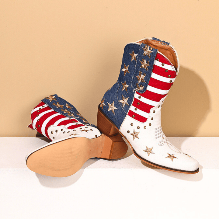 White cowboy boots with red stripes, blue panels and gold star details