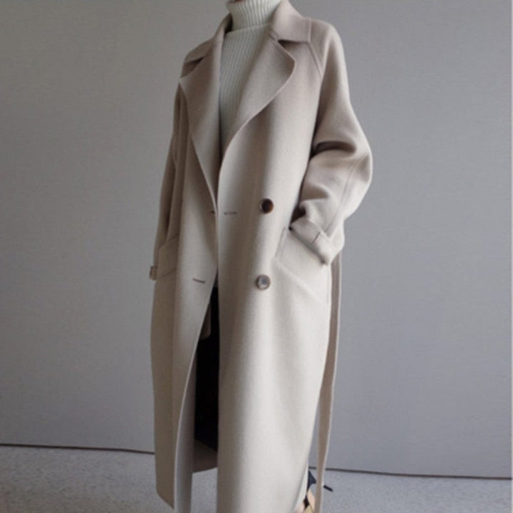 Women's long double-breasted belted coat with notch lapels