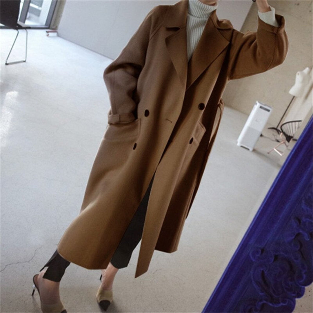 Women's long double-breasted belted coat with notch lapels