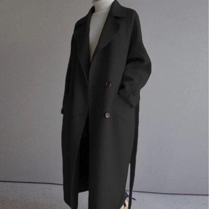 Women's long double-breasted belted coat with notch lapels