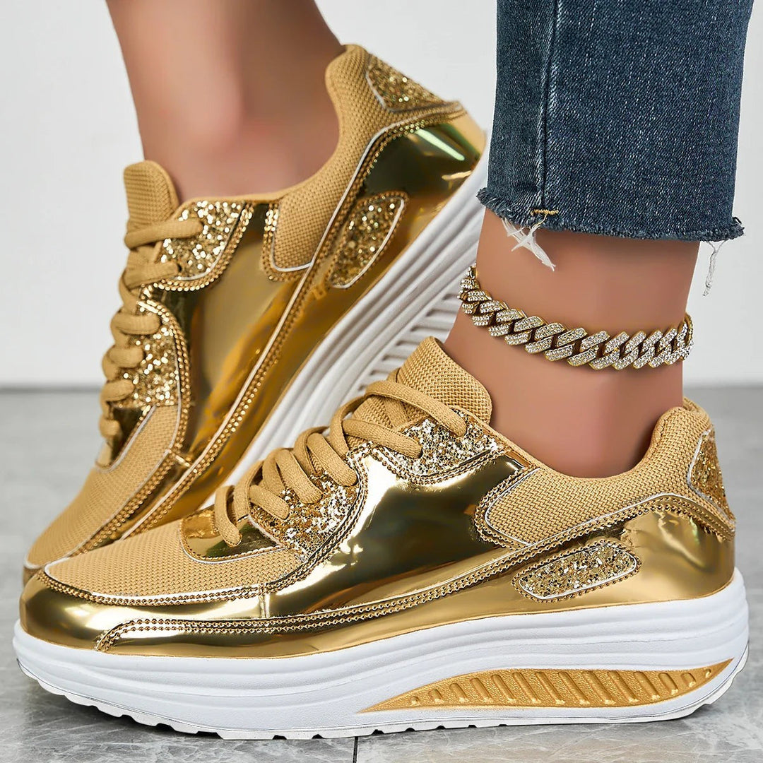 Women's glitter lace-up platform sneakers with metallic panels and raised soles
