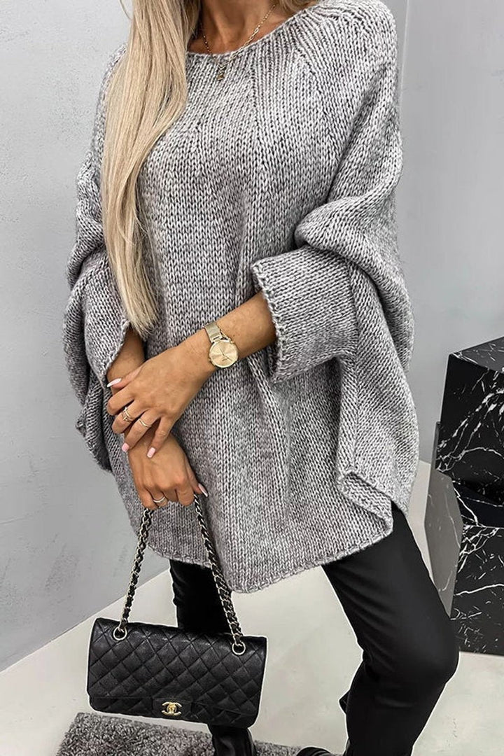 Women's oversized textured sweater with crew neckline and batwing sleeves