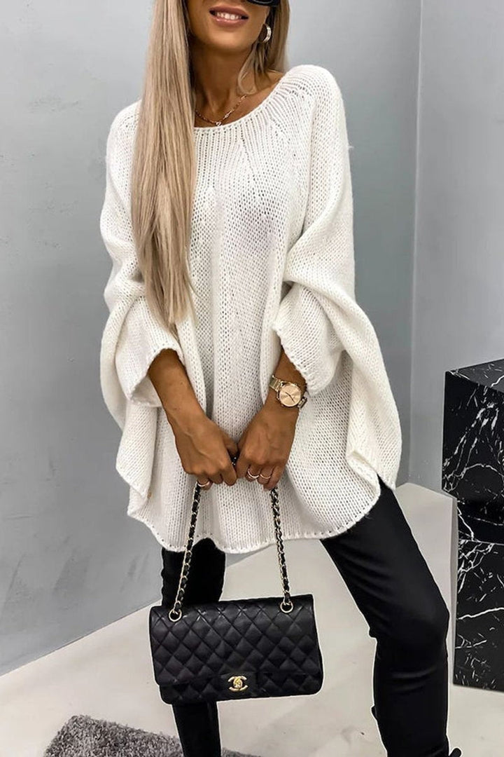 Women's oversized textured sweater with crew neckline and batwing sleeves