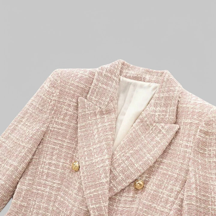Women's pink textured double-breasted blazer with notched lapels and flap pockets