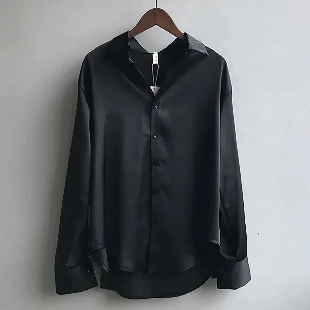 Women's relaxed long-sleeve collared blouse with button front and buttoned cuffs