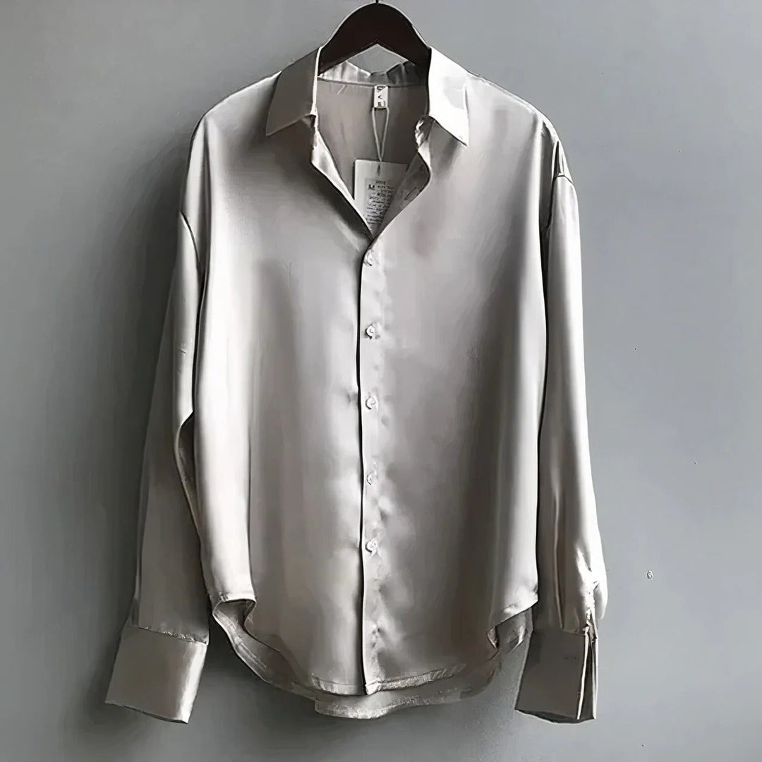 Women's relaxed long-sleeve collared blouse with button front and buttoned cuffs