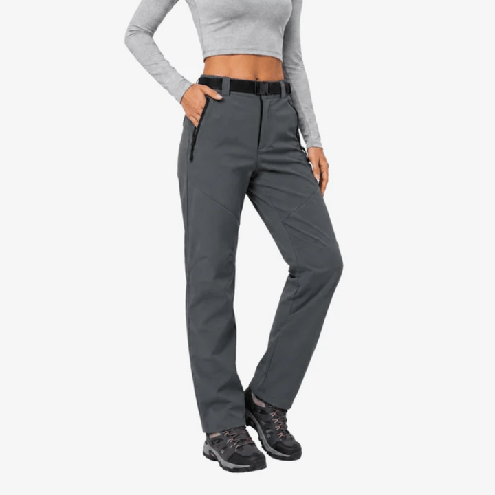 Women's full-length hiking trousers with a belted waist and zip pockets