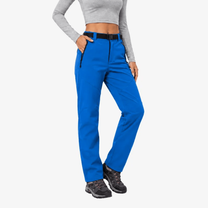 Women's full-length hiking trousers with a belted waist and zip pockets