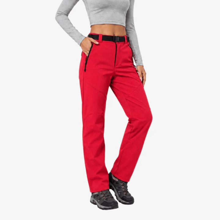 Women's full-length hiking trousers with a belted waist and zip pockets