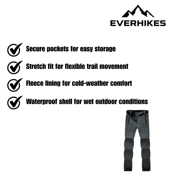 Women's full-length hiking trousers with a belted waist and zip pockets