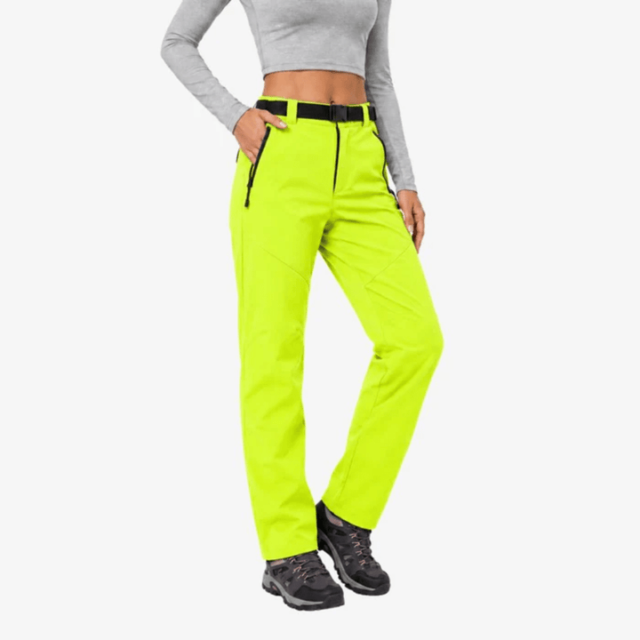 Women's full-length hiking trousers with a belted waist and zip pockets