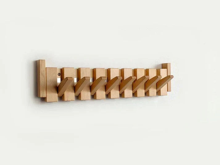 Wooden piano-style wall coat rack with fold-down hooks