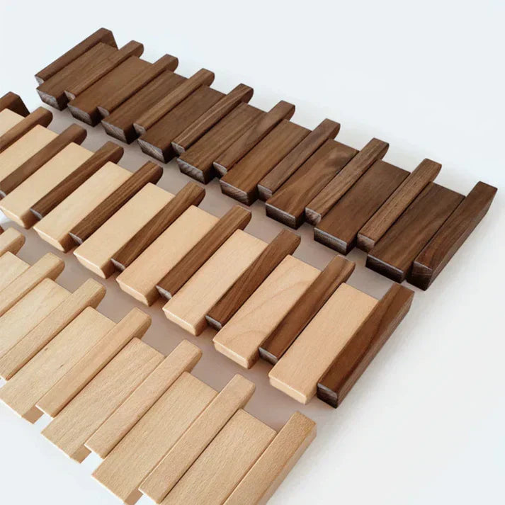 Wooden piano-style wall coat rack with fold-down hooks